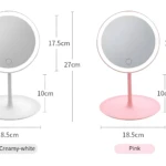 Espejo de tocador LED redondo rosa e blanco, 18.5cm ancho, 27cm alto, táctil.