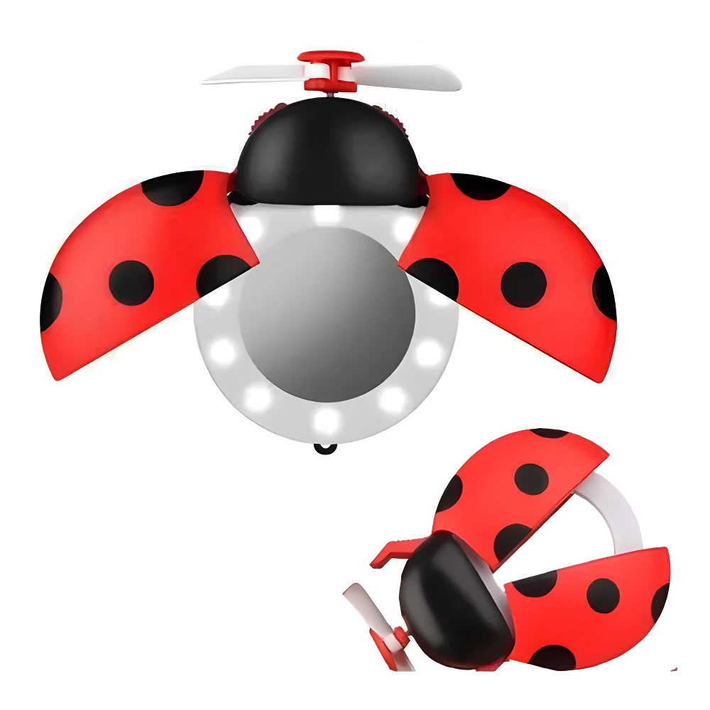 Espejo de maquillaje ladybug LED recargable con ventilador, alas rojas y negras, base blanca, con dos ángulos.