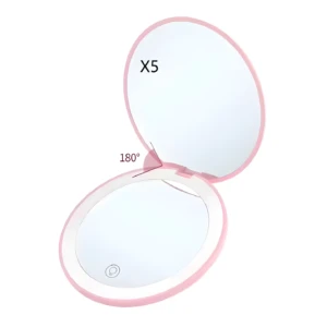 Espejo de maquillaje compacto rosa con luz LED, aumento x5, apertura 180 grados.