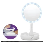 Espejo de maquillaje plegable blanco con luz LED y base organizadora.