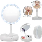 Espejo de maquillaje blanco plegable con luz LED, 10x aumento y compartimentos de almacenamiento.