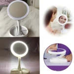 Espejo de maquillaje blanco plegable con luz LED y compartimentos, ideal para aplicar cosméticos.