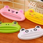 Exprimidor pasta dental animalitos, set x4, rosa, amarillo, verde y blanco, para aprovechar al máximo.
