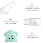 Extractor nasal bebé oso menta: cabezal silicona suave, botella transparente y diseño ergonómico para fácil succión.