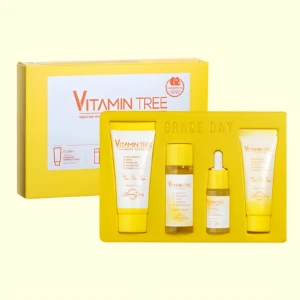 Set de cuidado facial Grace Day Vitamin Tree amarillo con limpiador, tónico, suero con gotero y crema en empaque abierto.