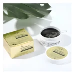 Parches hidro-gel negros de ácido hialurónico Grace Day en tarro abierto, junto a su caja dorada y tapa.