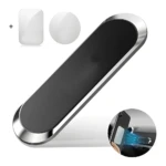 Soporte celular magnético largo negro y plateado, incluye un adhesivo rectangular y uno redondo, con vista de uso en tablero del auto.