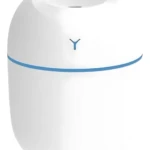 Humidificador ultrasónico blanco, compacto, con luz azul y símbolo "Y", ideal para aliviar sequedad y mejorar el sueño.