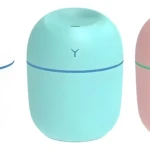 Set x2 humidificadores ultrasónicos mini portátiles en blanco, menta y rosa, para aliviar sequedad y mejorar el sueño.