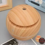 Humidificador difusor ultrasónico diseño bola madera, con luz LED, 3 colores disponibles.