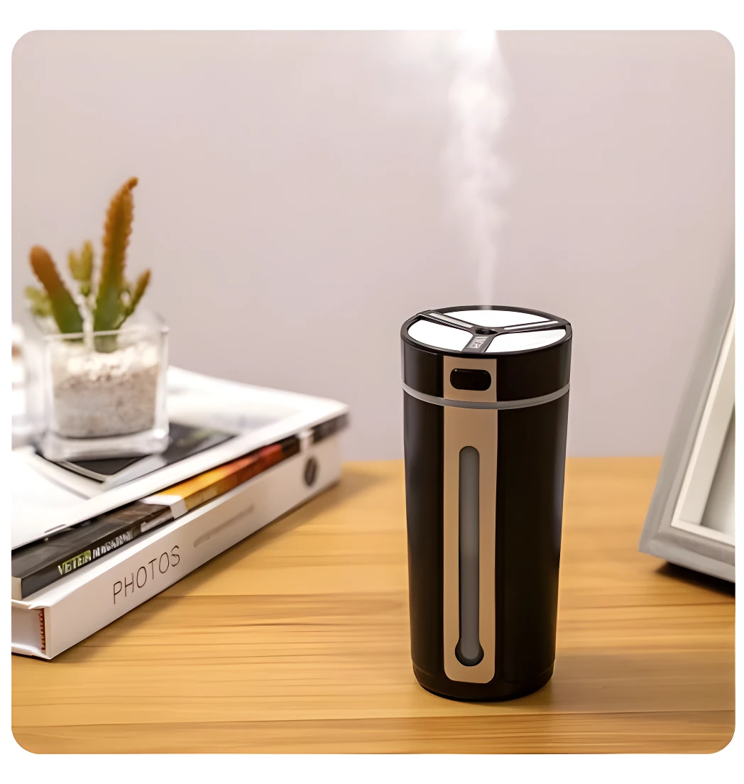 Humidificador portátil negro emitiendo vapor, ideal para coche y oficina, con ventana visible de nivel.