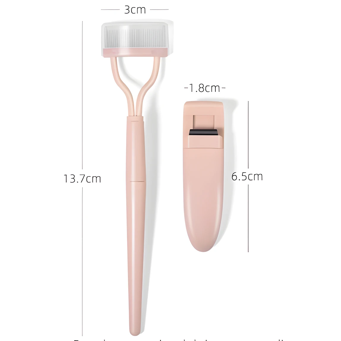 Rizador de pestañas y peine separador rosa de 13.7cm de largo. El peine mide 3cm de ancho y el rizador 6.5cm de alto y 1.8cm de ancho.