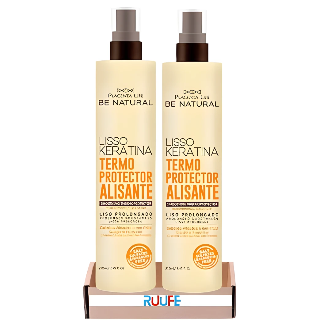 Dos botellas de spray Protector Térmico Keratina Alisante Be Natural para prolongar el liso, ambas color crema con etiquetas naranjas y blancas.