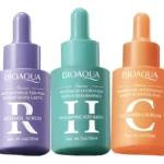 Trío de sueros BIOAQUA: Retinol (lila), Ácido Hialurónico (verde) y Vitamina C (naranja), 30ml cada uno, para antiedad.