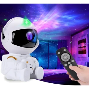 Proyector luz nocturna astronauta blanco proyectando nebulosa azul y rosa con estrellas, control remoto en mano.