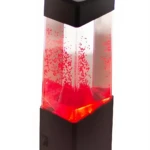 Lámpara de lava USB negra con líquido rojo y burbujas ascendentes, luz LED decorativa.