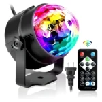 Proyector LED RGB para fiestas con control remoto, diseño esférico multicolor y base ajustable.