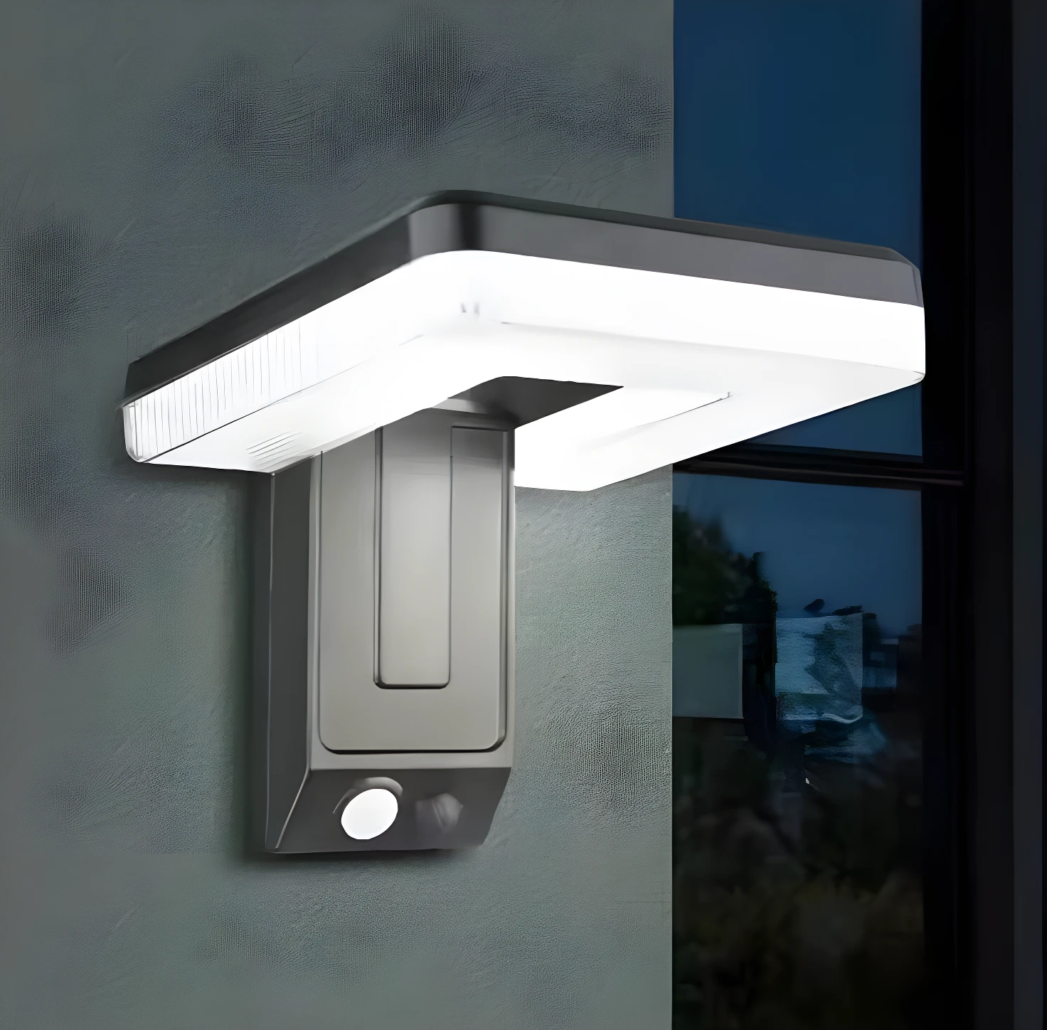 Lámpara solar LED exterior gris, impermeable, con sensor de movimiento, ilumina muros y ventanas.