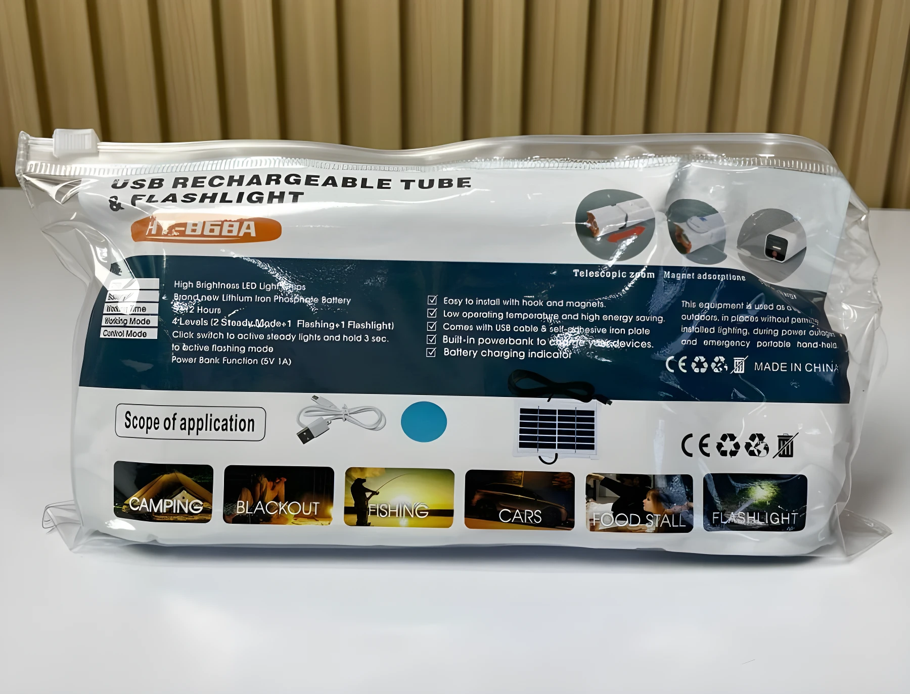 Lámpara solar LED portátil de emergencia con power bank. Incluye múltiples modos de luz y gancho magnético.