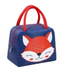 Lonchera térmica azul con cara de zorro feliz, asas rojas. Ideal para niños.