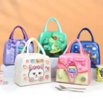 Loncheras térmicas infantiles 3D: morada con macarrón, blanca con gato, verde con dinosaurio, azul con excavadora, rosa con helado.