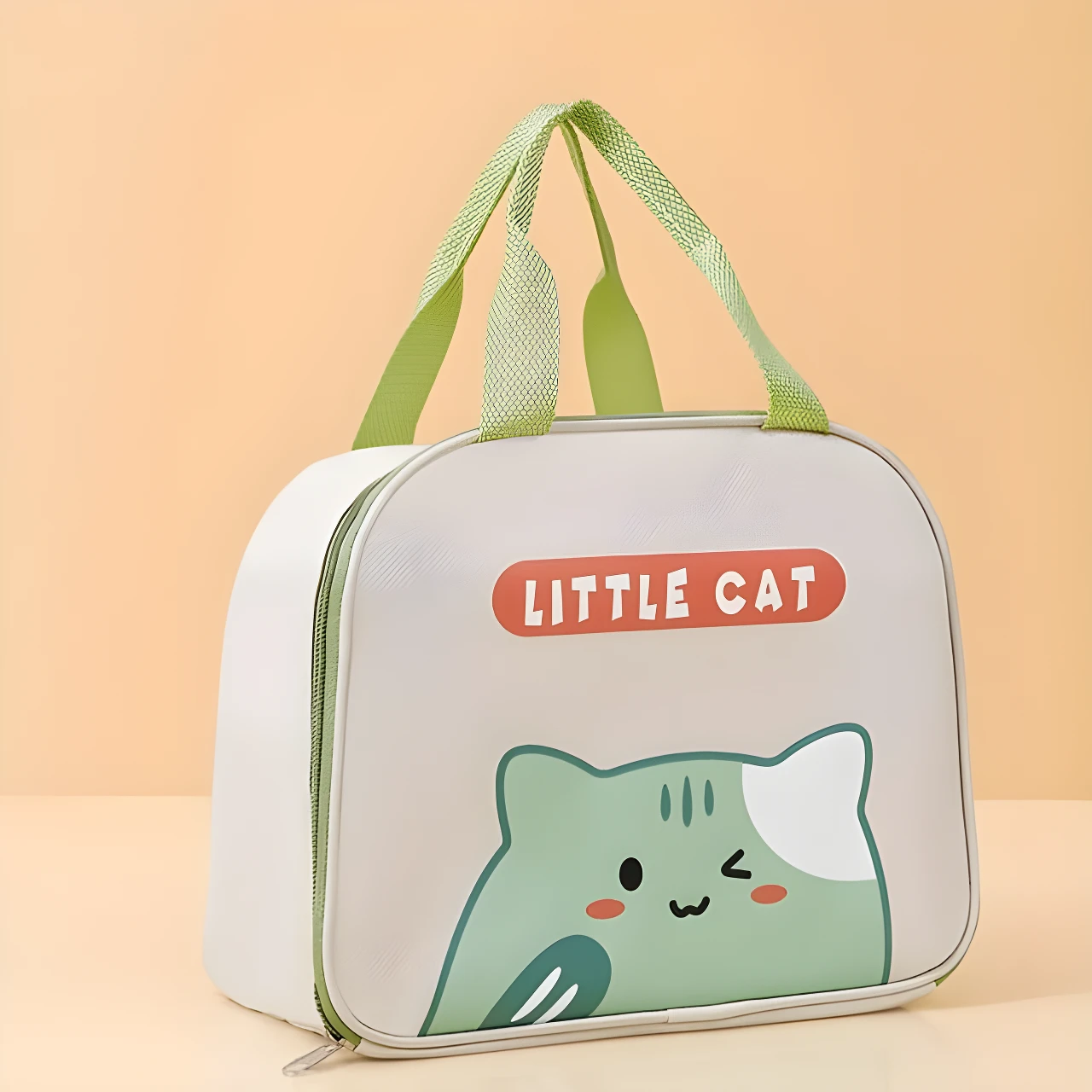 Lonchera térmica blanca con diseño de gato verde y texto "LITTLE CAT", asas verdes.