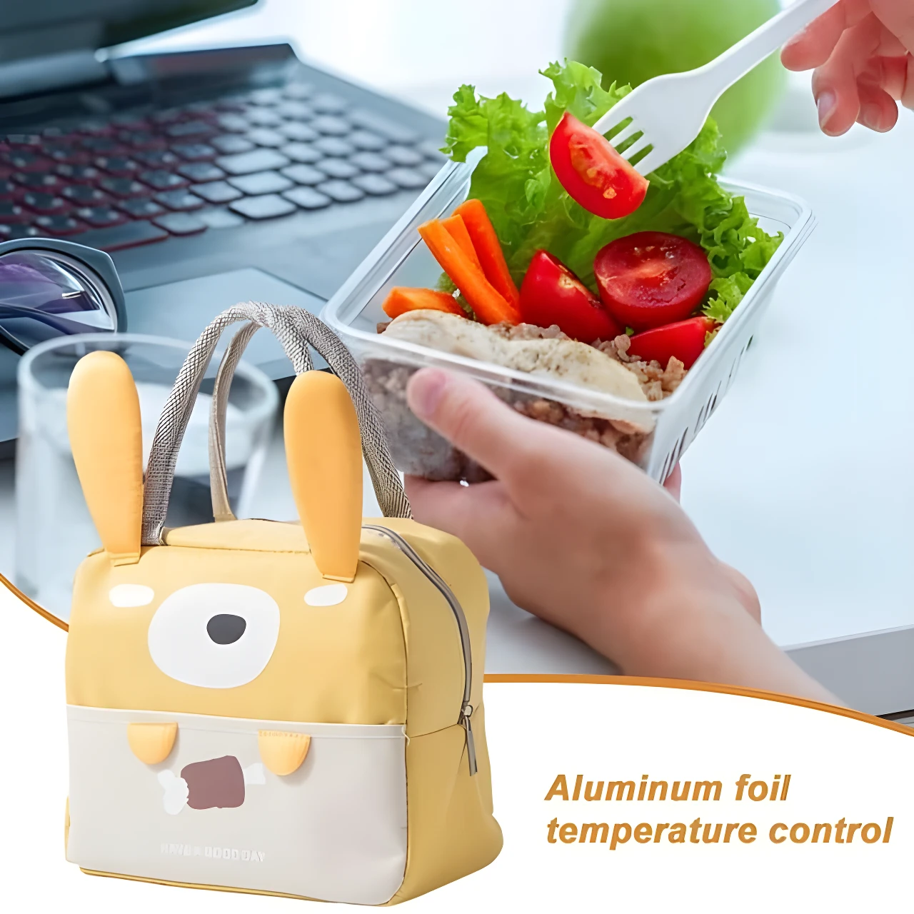 Lonchera térmica amarilla con orejas de conejo, ideal para mantener alimentos calientes o fríos en la oficina.