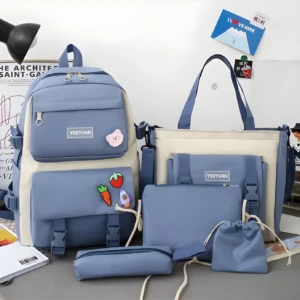 Set de 5 bolsos y maletas azules y crema, estilo casual para dama.