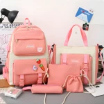 Maleta bolso 5 en 1 color rosa y crema para dama. Incluye varios compartimentos y diseños.