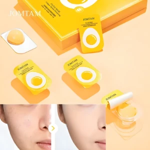 Set de 2 mascarillas Jomtam en empaque individual con diseño de huevo, tono amarillo vibrante, para hidratación profunda de piel cansada.