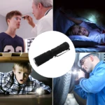 Linterna LED médica de aluminio negra con clip, ideal para exámenes detallados y exploración en espacios reducidos.