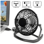 Mini ventilador USB negro, silencioso y ajustable 360º, conectado a laptop.
