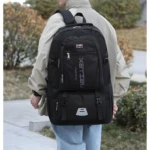 Morral mochilero negro grande para hombre, con múltiples compartimentos y logo "SPORTS" y "FASHION".