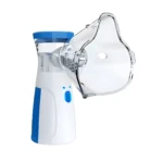 Nebulizador portátil ultrasónico mesh blanco y azul con mascarilla transparente para tratamiento respiratorio.