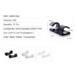 Set x2 clips organizadores de cables en negro, blanco y transparente. ABS, 3x1.1x1cm.