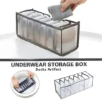 Organizador plegable gris para ropa interior con 7 compartimentos, mostrando cómo guardar prendas dobladas y su limpieza en agua.