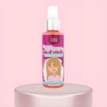 Perfume capilar Kaba en botella rosa con de chica, aroma intenso y duradero.