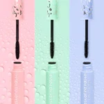 Pestañinas pastel a prueba de agua Trendy, una rosada, una menta y una lila, con envase y aplicador negro.
