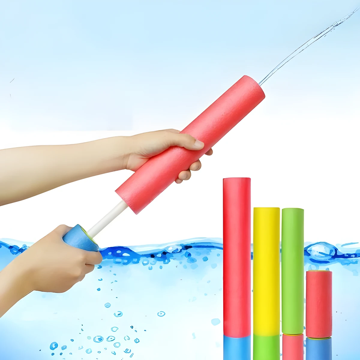 Manos usan lanza chorros de agua espuma rojo sacando chorro sobre agua. Se ven listones de colores flotando.