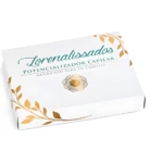 Caja blanca con diseño dorado y verde para tratamiento capilar, diseño floral.