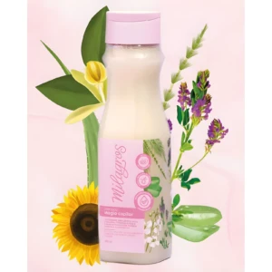 Shampoo Milagros Magia Capilar en envase blanco con tapa rosa, decorado con flores, vainilla y girasol. Contenido 450 ml.