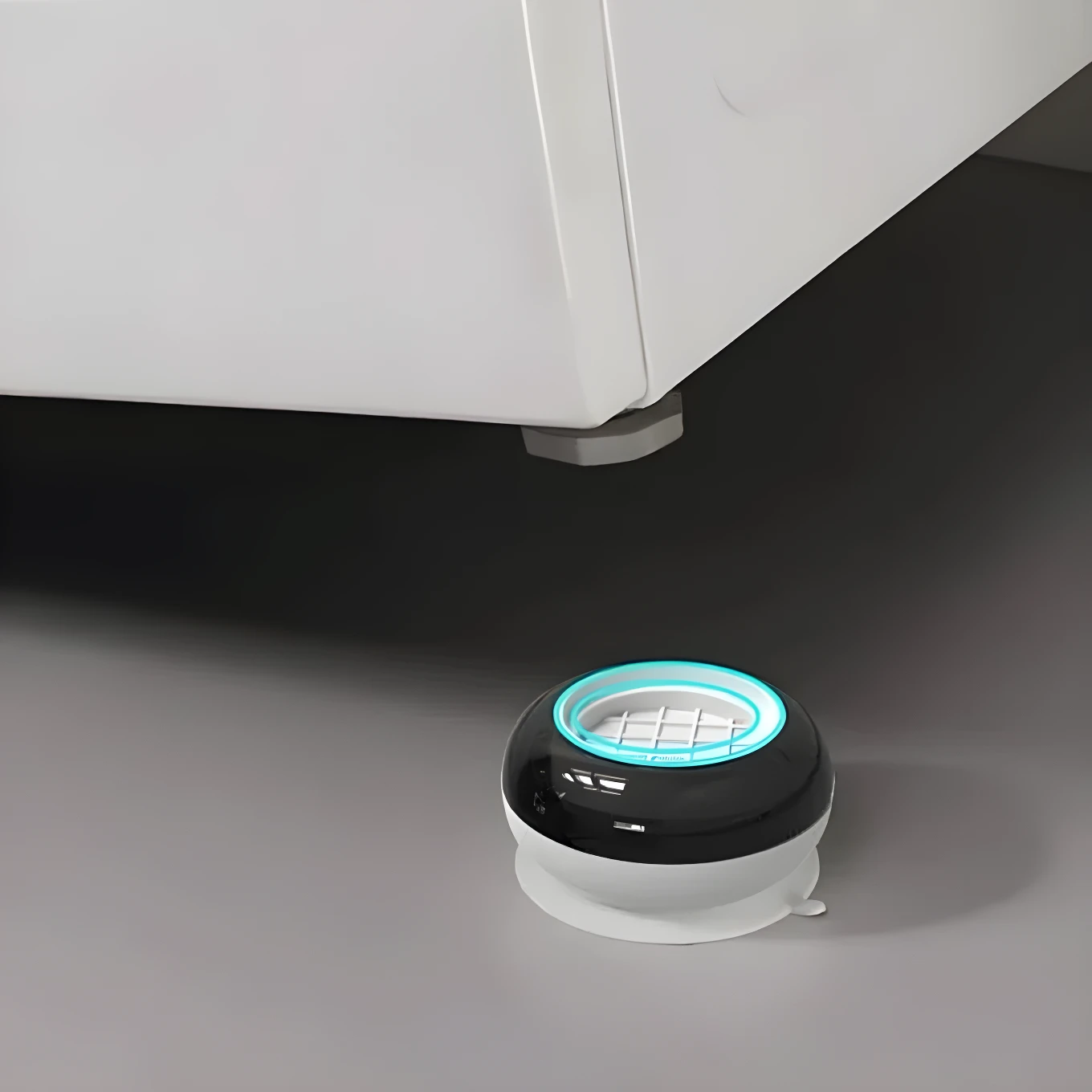Soportes antivibración de goma negra y blanca para electrodomésticos, reducen ruido y protegen suelos.