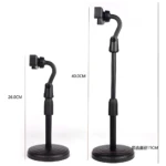 Soporte para celular de escritorio negro, ajustable en altura y ángulo, ideal para videollamadas.