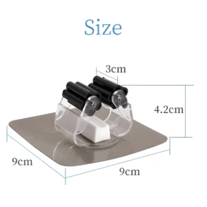 Soporte de pared gris con abrazadera doble negra para escobas, medidas 9x9x4.2 cm.