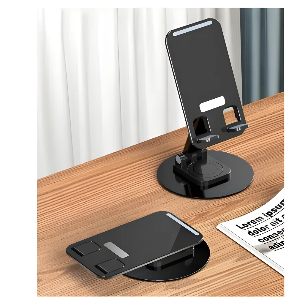 Set x4 soportes plegables negros para celular, ajustables en ángulo, sobre escritorio de madera.