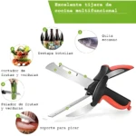 Tijeras de cocina multifuncionales color naranja y negro, con pelador y cortador de verduras.