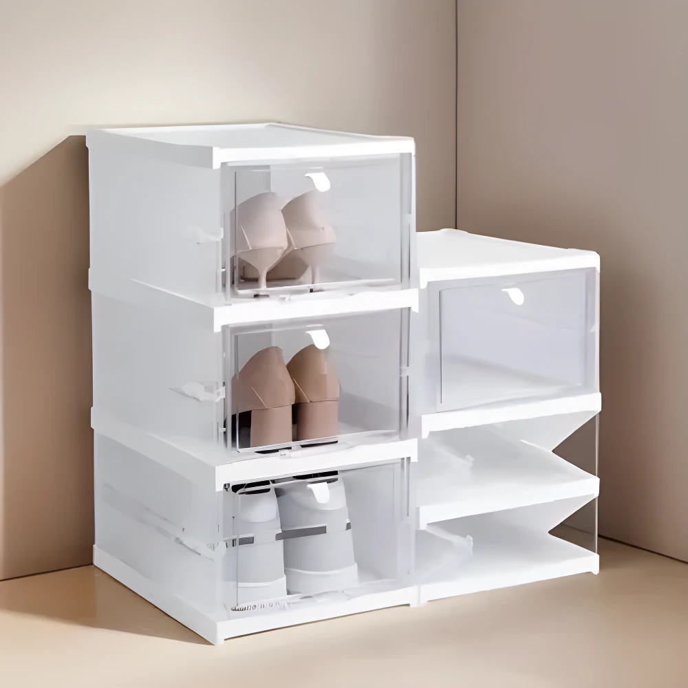 Zapatero plegable blanco de 3 niveles con compartimentos transparentes y calzado organizado.