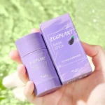 Mascarilla facial en barra de color lila, con empaque morado y dibujo de berenjena. Ideal para piel.
