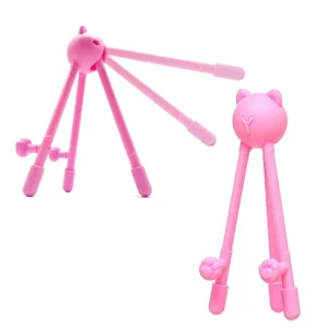 Soporte para celular rosa con diseño de gato y dos bases de apoyo ajustables, ideal para móviles.