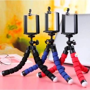 Trípodes flexibles para celular con patas de espuma negra, azul y roja.